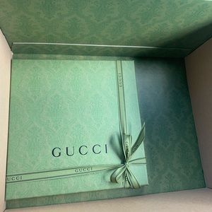 Gucci shirt box with Gucci ribbon